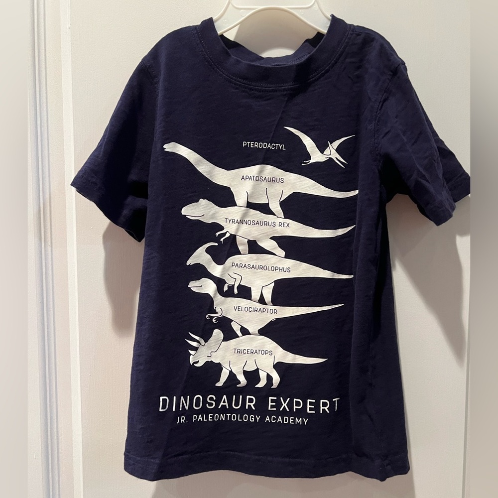 Carter’s graphic T-shirt. Boys 4. Navy with white dinosaur graphic.